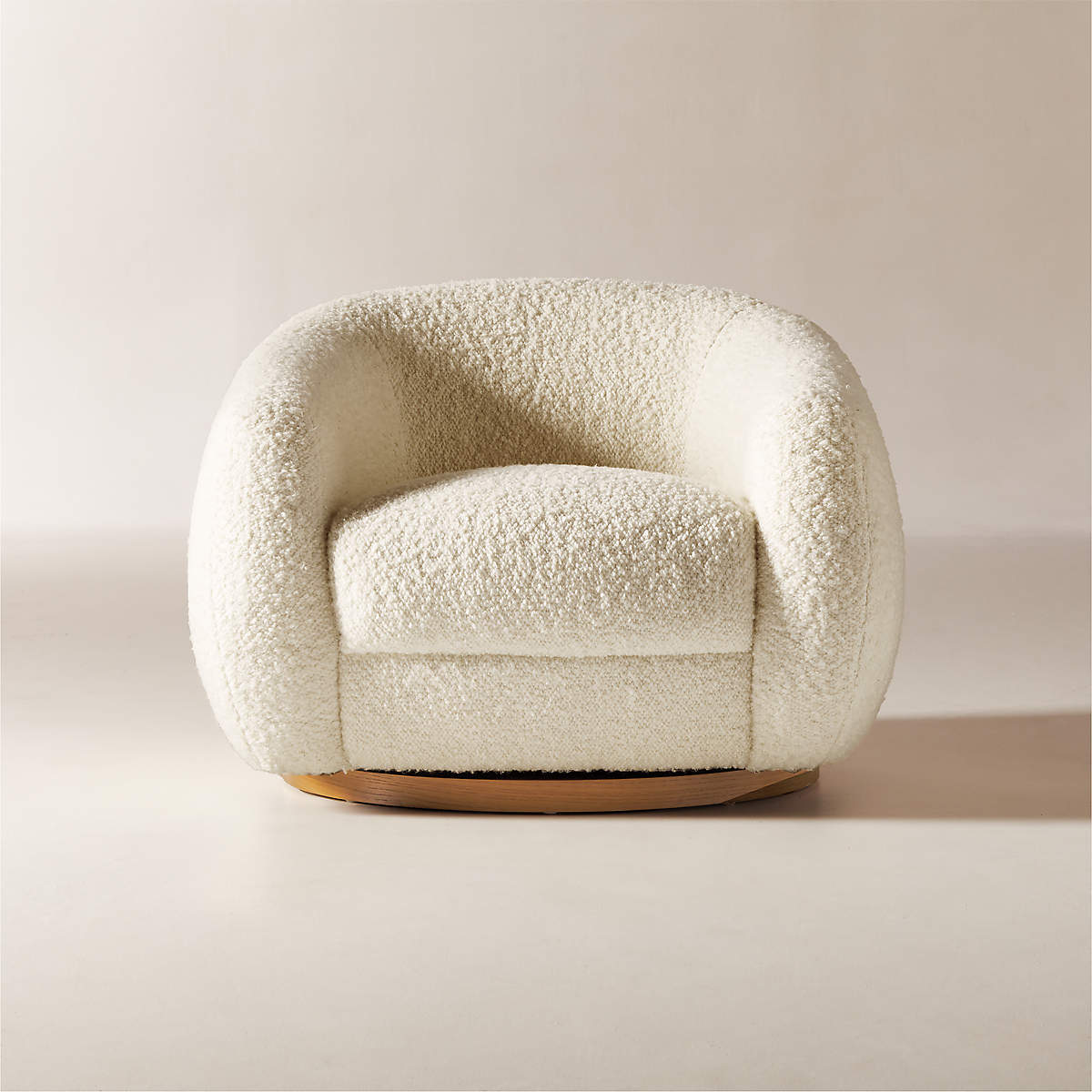 Ami Boucle Swivel Arm Chair